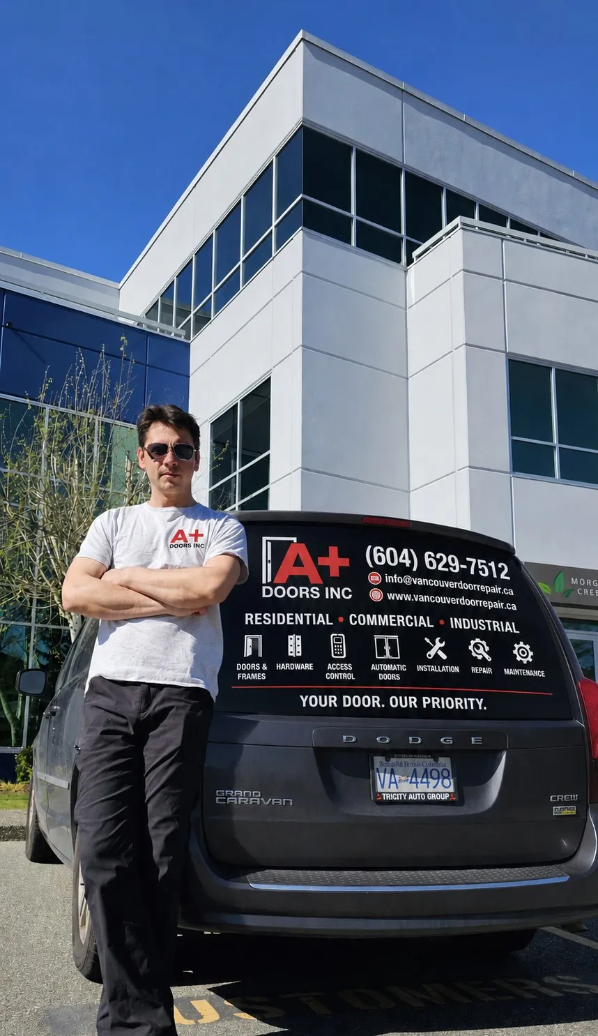 Door Helper technician with the company service van, Greater Toronto Area